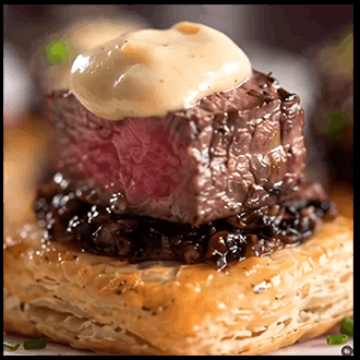 Bite-sized wellingtons in flaky pastry