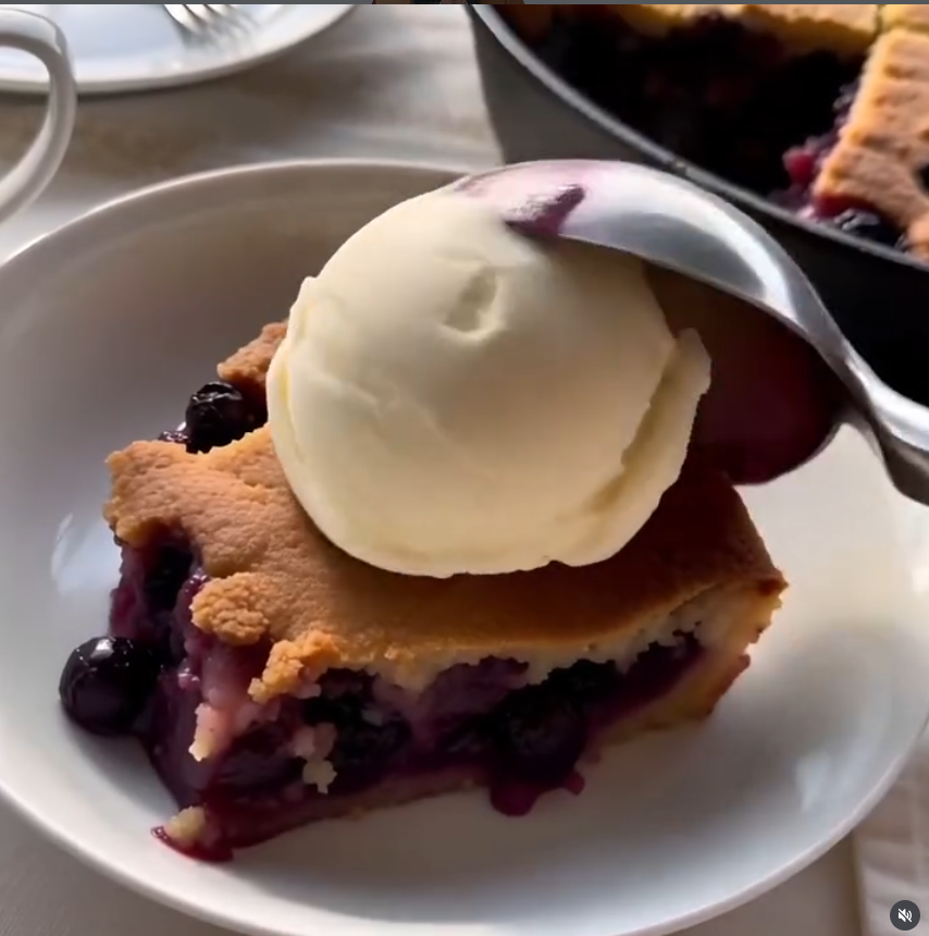 Blueberry cornbread cobbler dessert from Dogan's Recipes baked in a cast iron skillet